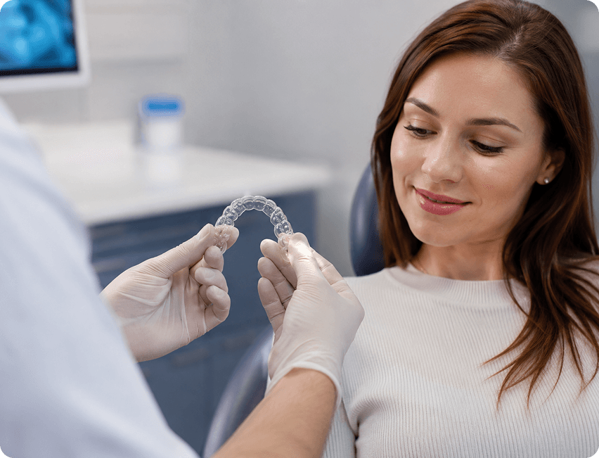 Dentist discussing the cost and treatment planning for NiTime aligners in High Wycombe