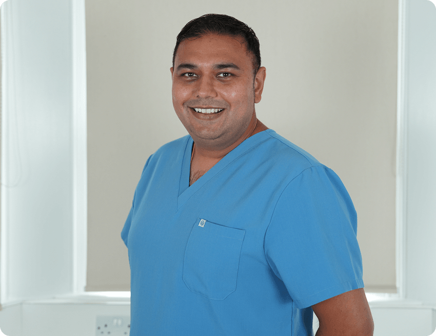 Dentist providing gum health advice to a patient in High Wycombe