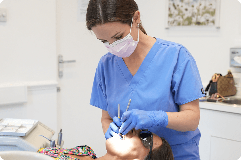 Dentist explaining root canal treatment during a consultation in High Wycombe